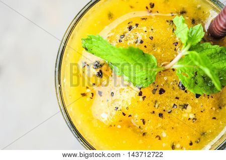 refreshing passion fruit orange juice close up and detail