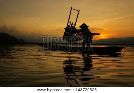 Thailand fishermen out fishing in the morning.