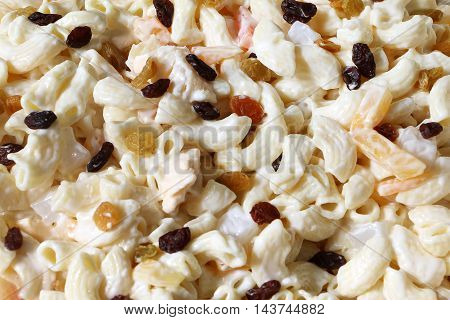 Macaroni salad mixed with fruit cocktail and mayoinaise