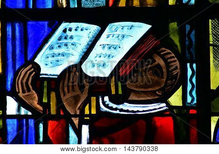 Poissy France - august 6 2016 : stained glass window of the historical collegiate church where the king Saint Louis was baptised