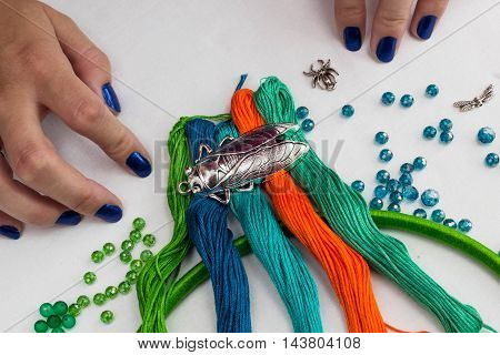set for making a Dreamcatcher beads thread on a white background