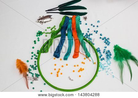 set for making a Dreamcatcher beads thread on a white background