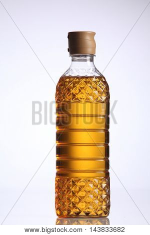 bottle of the apple oligo syrup on the white background
