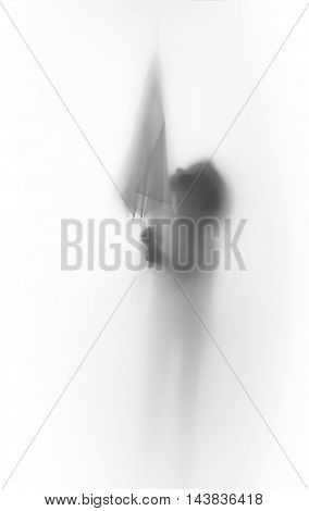 Diffuse body slihouette of a young girl with umbrella