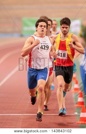 VIENNA, AUSTRIA - JANUARY 31, 2015: Albert Holibka (#429 Czech Republic competes in the men's 800m event during an indoor track and field event.