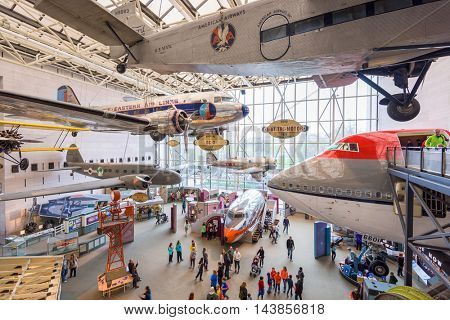 WASHINGTON DC - APRIL 8, 2015: Visitors enjoy The National Air and Space Museum of the Smithsonian Institution in Washington DC.