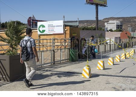 TIJUANA MEXICO - AUGUST 20 2016: During construction a temporary access is open from the Tijuana River pedestrian bridge to the new San Ysidro Port of Entry known as PedWest.