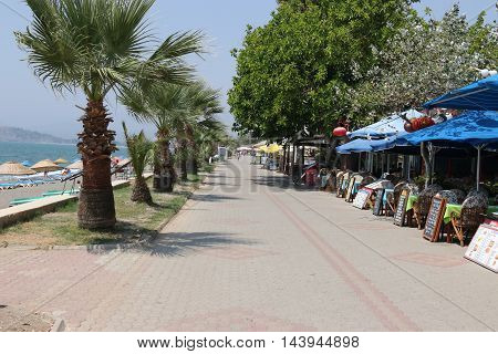 1ST AUGUST 2016,CALIS,TURKEY:  The empty promenade at Calis beach in Turkey, 1st august 2016