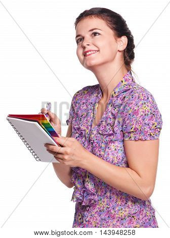 Smiling young girl with books isolated on white background