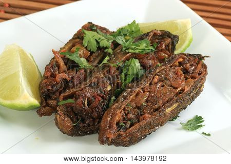 spicy stuffed bitter gourds karela with lime and coriander