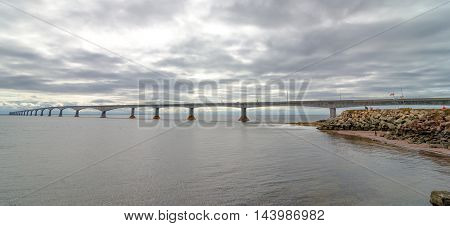 P.E.I. and New Brunswick Confederation Bridge.  Wide and long angle view of the bridge on an muggy, overcast summer day in August.