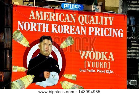 New York City - June 8 2013: Humourous advertising billboard for Wodka (Vodka) featuring North Korean dictator Kim Jun-Un on the exterior of a building in Soho
