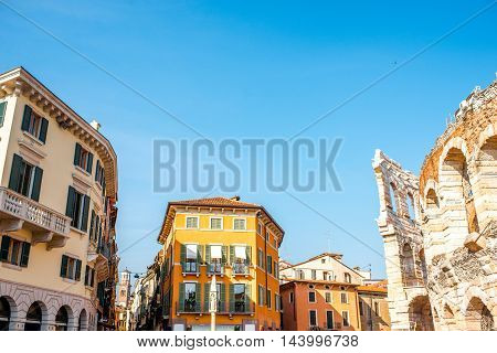 Beautiful buildings on Bra square near Arena in Verona city in Italy