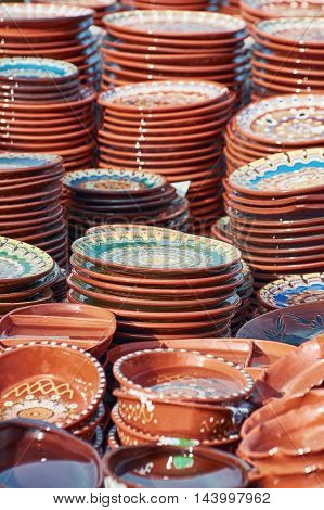 A Lot of Earthenware Crockery on the Pottery Market