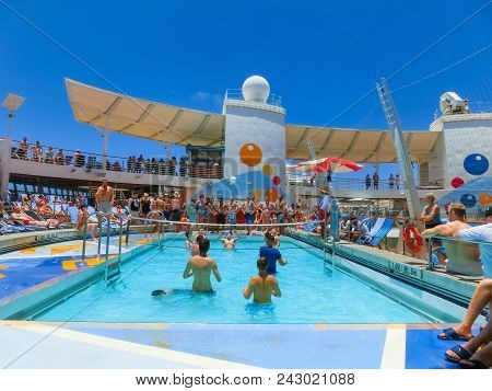 Cape Canaveral, Usa - May 03, 2018: The People Playing At Pool At Upper Deck In Mini Volleyball At C