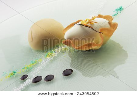 Portion Of Dessert With Glazed Cassata Half Sphere And Ice Cream