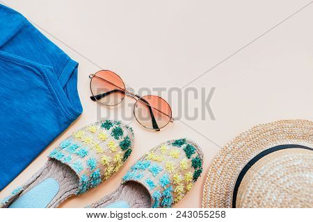 Summer Fashion Flatlay With Espadrille Sandals, T-shirt, Gradient Round Sunglasses And Straw Hat On 