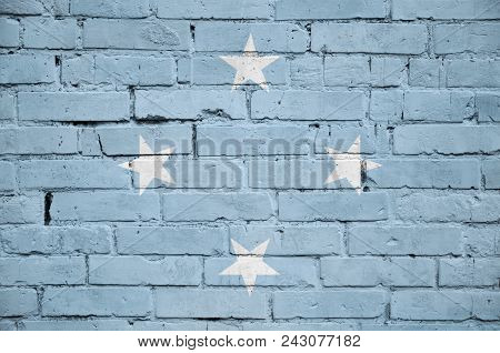 Micronesia Flag Is Painted Onto An Old Brick Wall