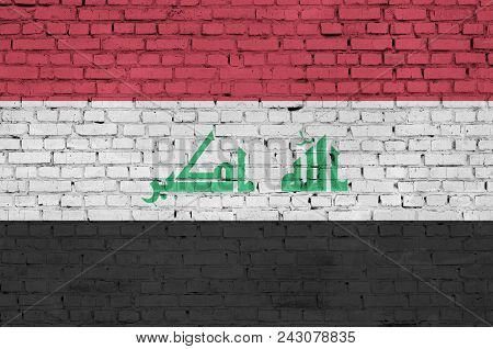 Iraq Flag Is Painted Onto An Old Brick Wall
