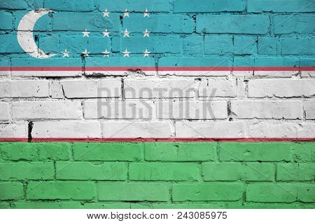 Uzbekistan Flag Is Painted Onto An Old Brick Wall