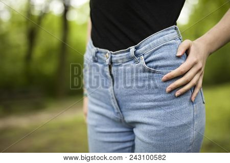 Closeup At Women Hips In Denim At Outdoors