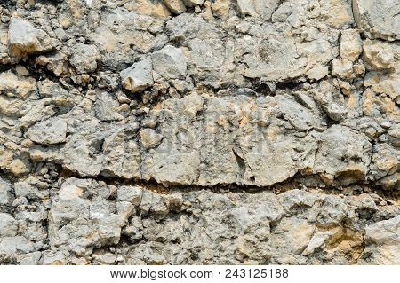 Textured Stone Background Rubble Ballast In Natural Form In The Rock Wall.
