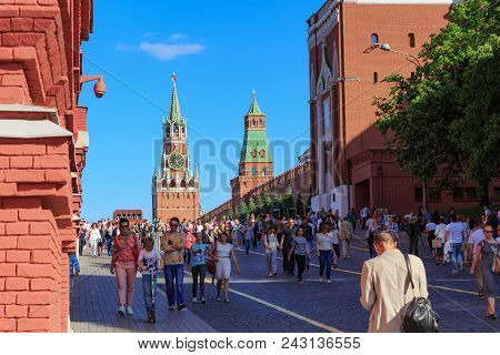 Moscow, Russia - May 27, 2018: Tourists Follow The Kremlevskiy Passage Between State Historical Muse