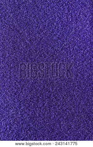 Violet Fleecy Material Texture. Purple Detailed Fibers Fluffy Surface Background.