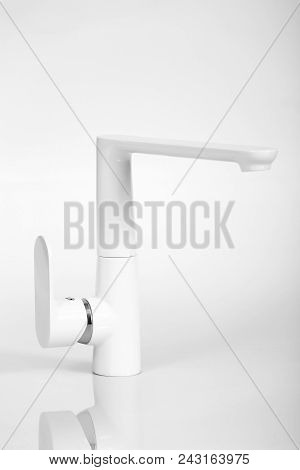 Photo Of Water Tap On White Phon