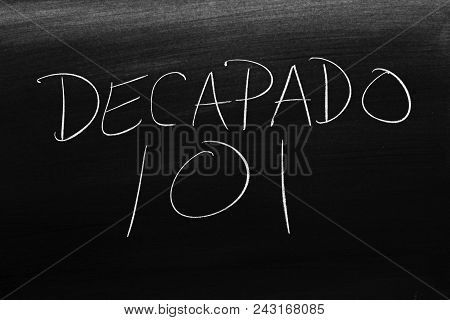 The Words Decapado 101 On A Blackboard In Chalk.  Translation: Pickling 101