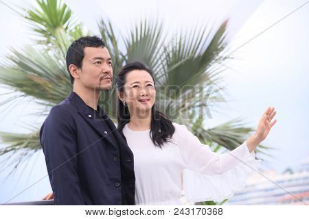 Zhao Tao (R) and Liao Fan (L) pose during the photocall for the film 'Ash Is Purest White' in competition at the 71st Cannes Film Festival, France on May 12, 2018.