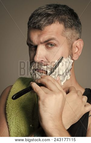 Handsome Man Face. Man Cut Beard And Mustache With Razor And Shaving Brush. Fashion And Beauty, Inno