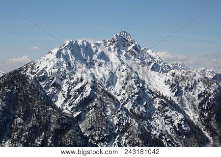 Snowed Mountains With White Snow In Winter In The Northern Italy