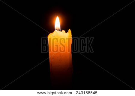 Abstract Single Lit Candle With Quite Flame