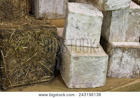 Cheese Of Artisanal Production Aged In The Cave And Covered With Organic Straw