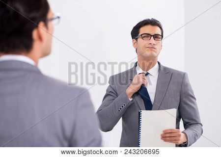 Politician planning speach in front of mirror