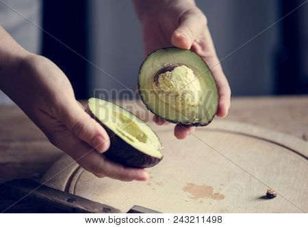 Organic avocado cut into halves food photography recipe idea