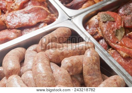 Various Pieces Of Meat In Store Display
