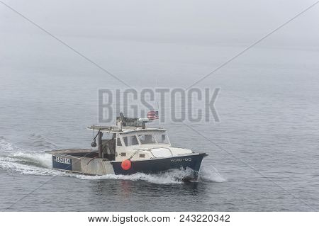 New Bedford, Massachusetts, Usa - May 31, 2018: Lobster Boat Honi-do Approaching Hurricane Barrier O