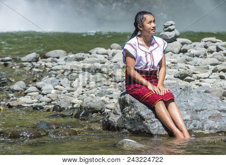 Batad, Philippines - May 02 : Girl From Ifugao Minority Near A Waterfall In Batad The Philippines On