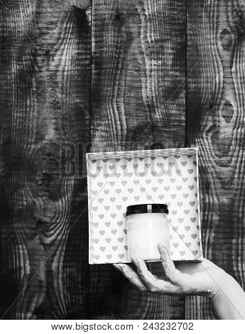 Female Hand Smeared In Golden Paint Or Glister Holding Handmade Pink Polka Dots Valentine Box With P