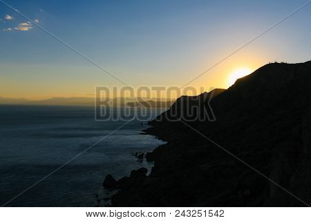 Sea And Mountains Landscape At Cape Meganom, The East Coast Of The Peninsula Of Crimea. Summer Sunse