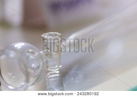 Flasks Close Up Equipment In Laboratory Background.