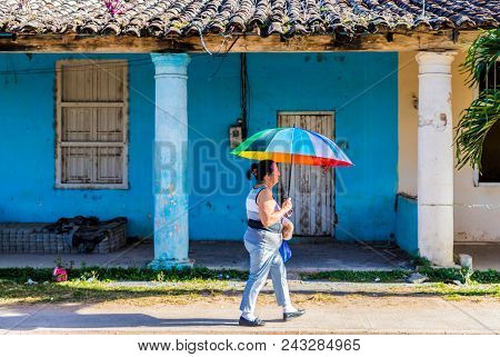 Vinales, Cuba. January 2018. A View Of A Woman Walking , In Vinales, Cuba.