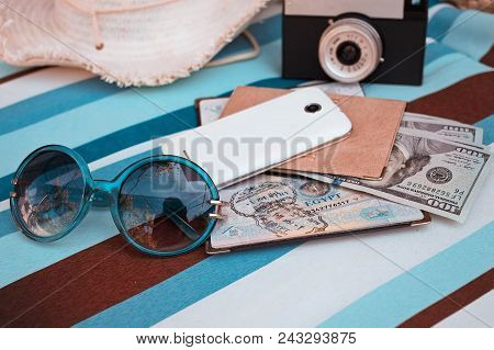 Money, Passport, Camera And Smartphone. Concept Of Travel