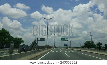 Tien Giang, Vietnam - Aug 31, 2017. Cars Running On Highway In Sunny Day.