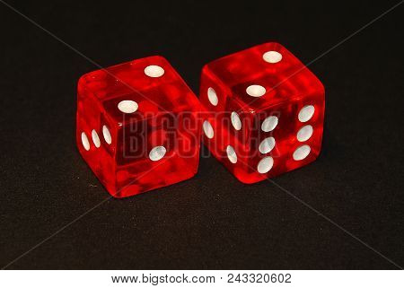 Two Dice On A Black Desk, Result Four (4), Doublets  Of Two (2)
