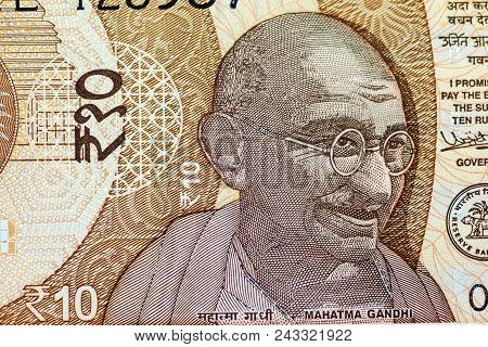 Closeup Of Mahatma Gandhi On New Indian Ten Rupee Note Currency