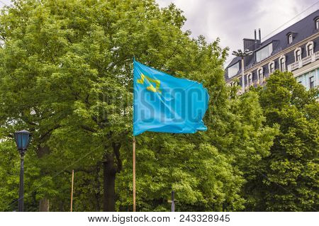Crimean Tatar Flag In The Wind At Clowdy Day