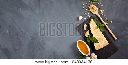 Parmesan Cheese, Olive Oil, Basil, Garlic , Pine Nuts - Fresh Ingredients For Pesto Cooking Recipe. 